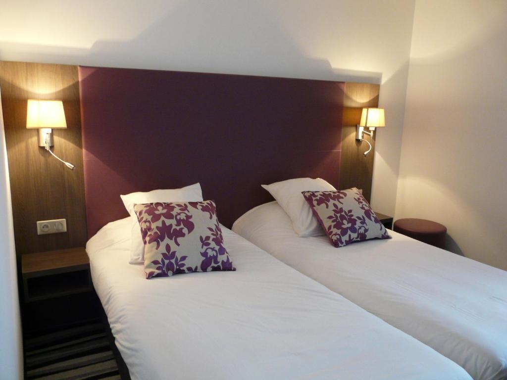 กีเรียต ชองต์ เควนติน เอง เวลิเนส - มงทินี่ Hotel Montigny-le-Bretonneux ห้อง รูปภาพ