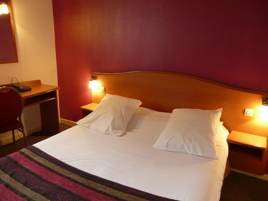 กีเรียต ชองต์ เควนติน เอง เวลิเนส - มงทินี่ Hotel Montigny-le-Bretonneux ห้อง รูปภาพ