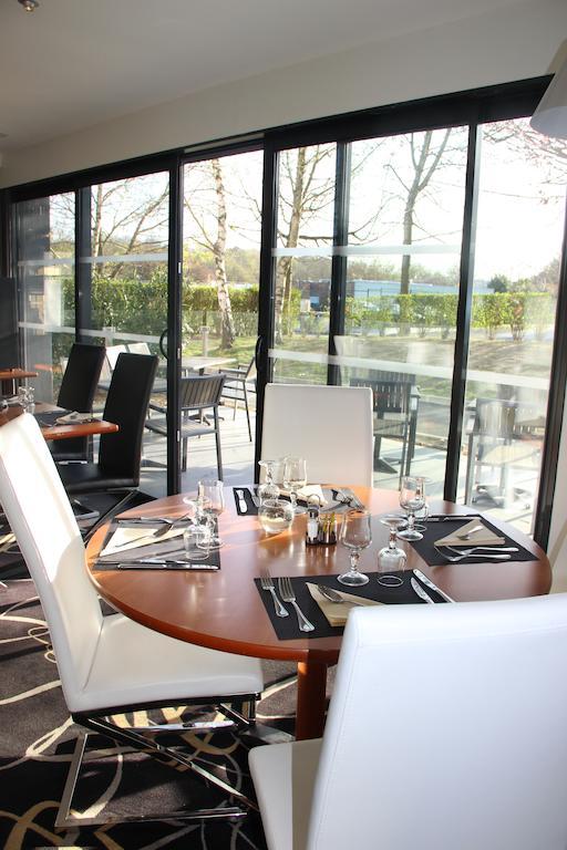 กีเรียต ชองต์ เควนติน เอง เวลิเนส - มงทินี่ Hotel Montigny-le-Bretonneux ภายนอก รูปภาพ
